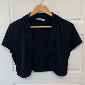 Black shrug